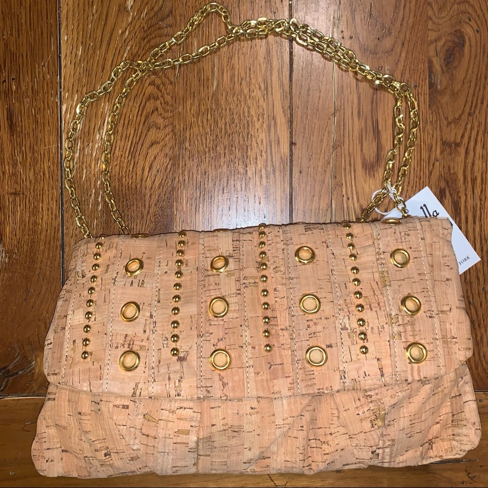 Natural cork and gold eyelet handbag